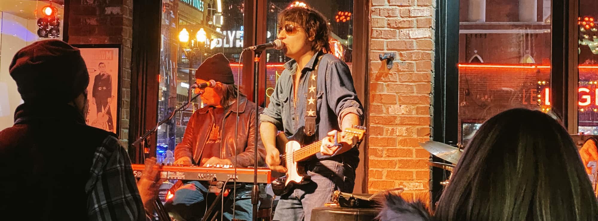 bar singer on guitar in Bloomington