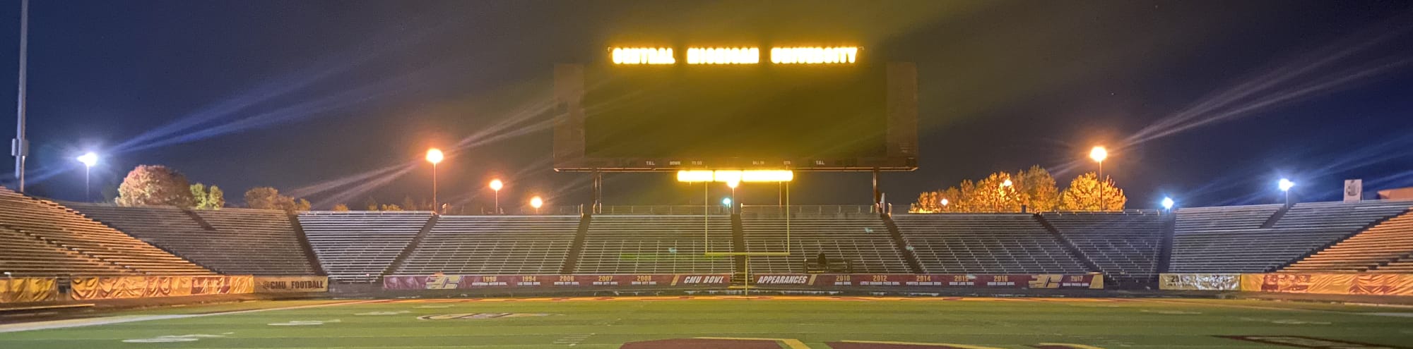 empty football stadium at night under the lights Bloomington